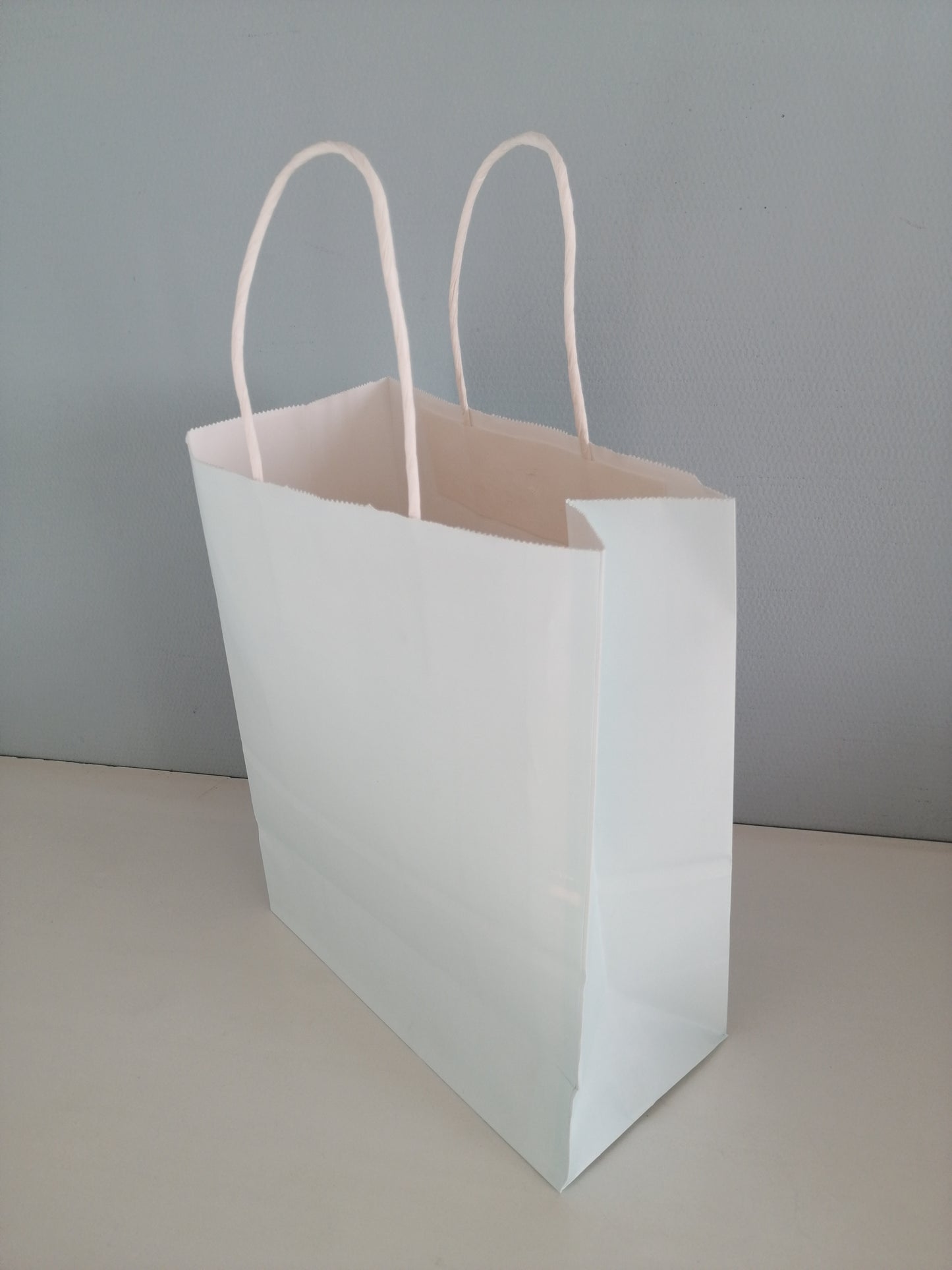 Sac papier bleu pastel M