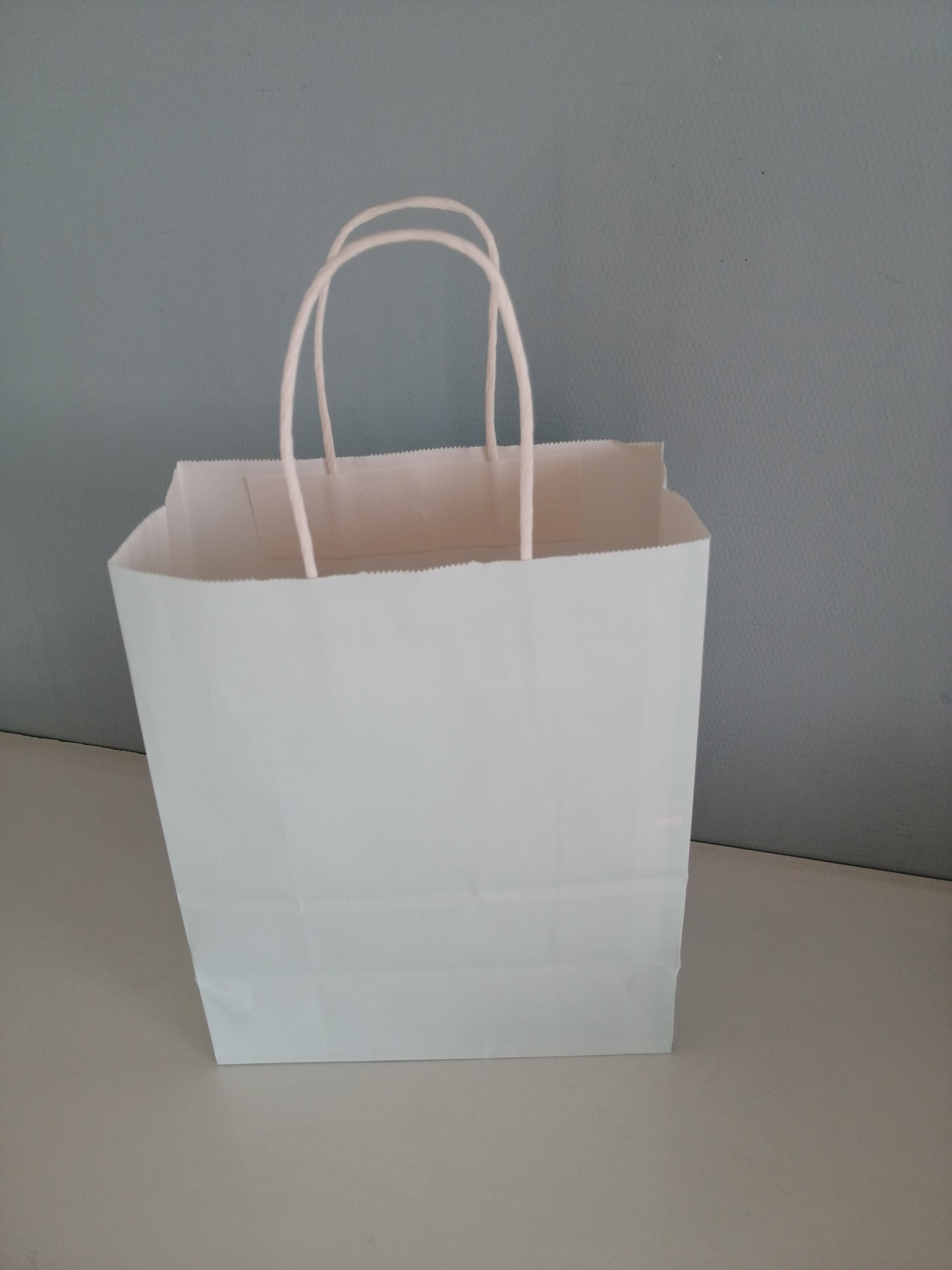 Sac papier bleu pastel M