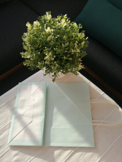 Sac papier bleu pastel M